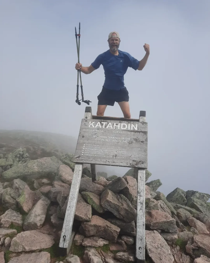 Jeff Mitchell on Mount Katahdin after finishing an over 2,000 mile hike on the Appalachian Trail